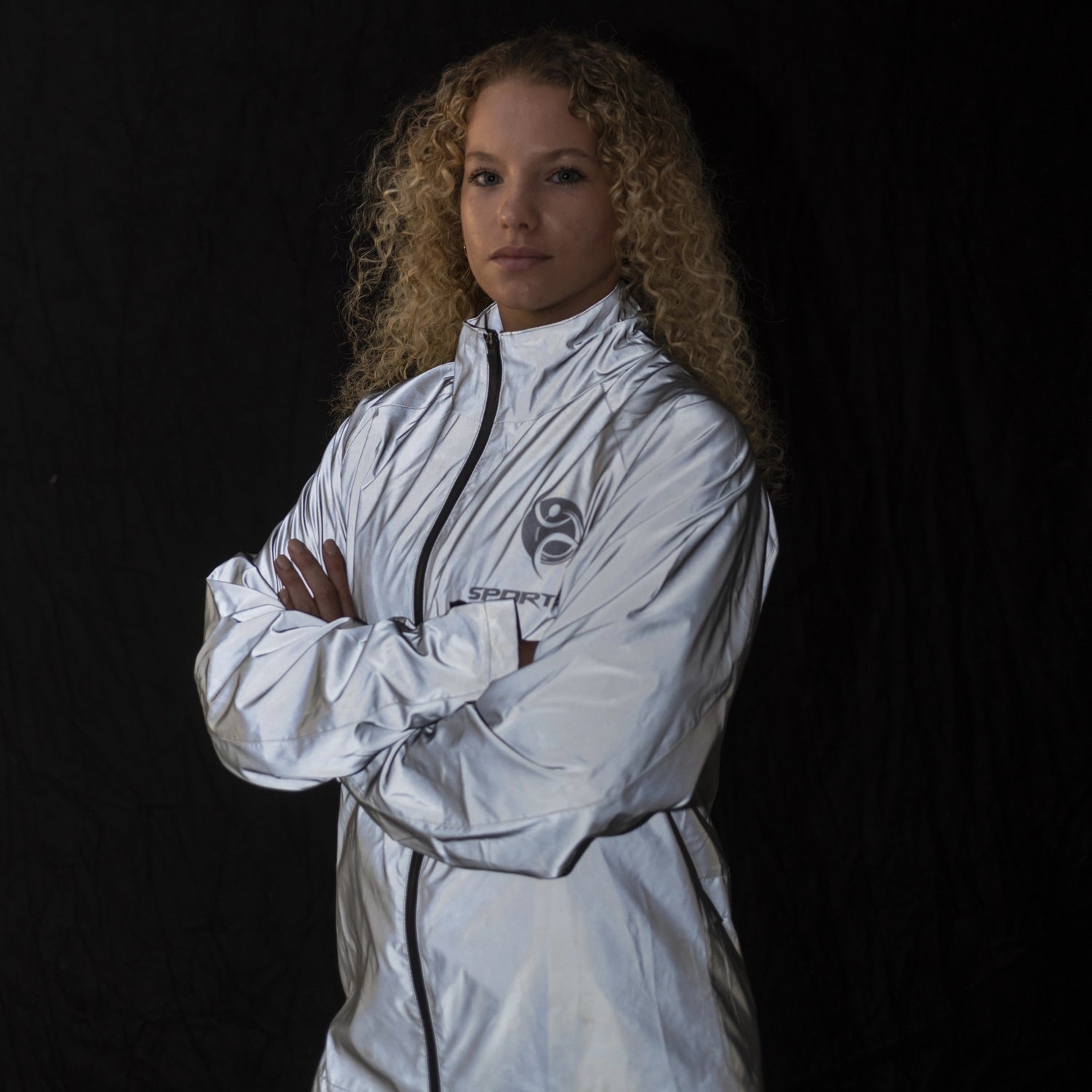 Side view of Kallie Reflective Cycling Jacket showing reflective detailing and ergonomic fit